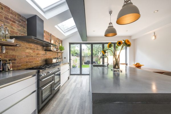 80mm thick concrete kitchen island with waterfall end panels