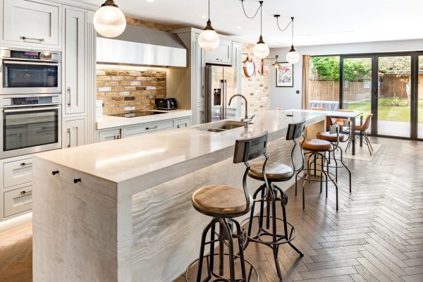 Board-formed concrete worktops with chunky jointed legs