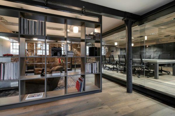 Concrete boardroom table in open plan architectural design studio